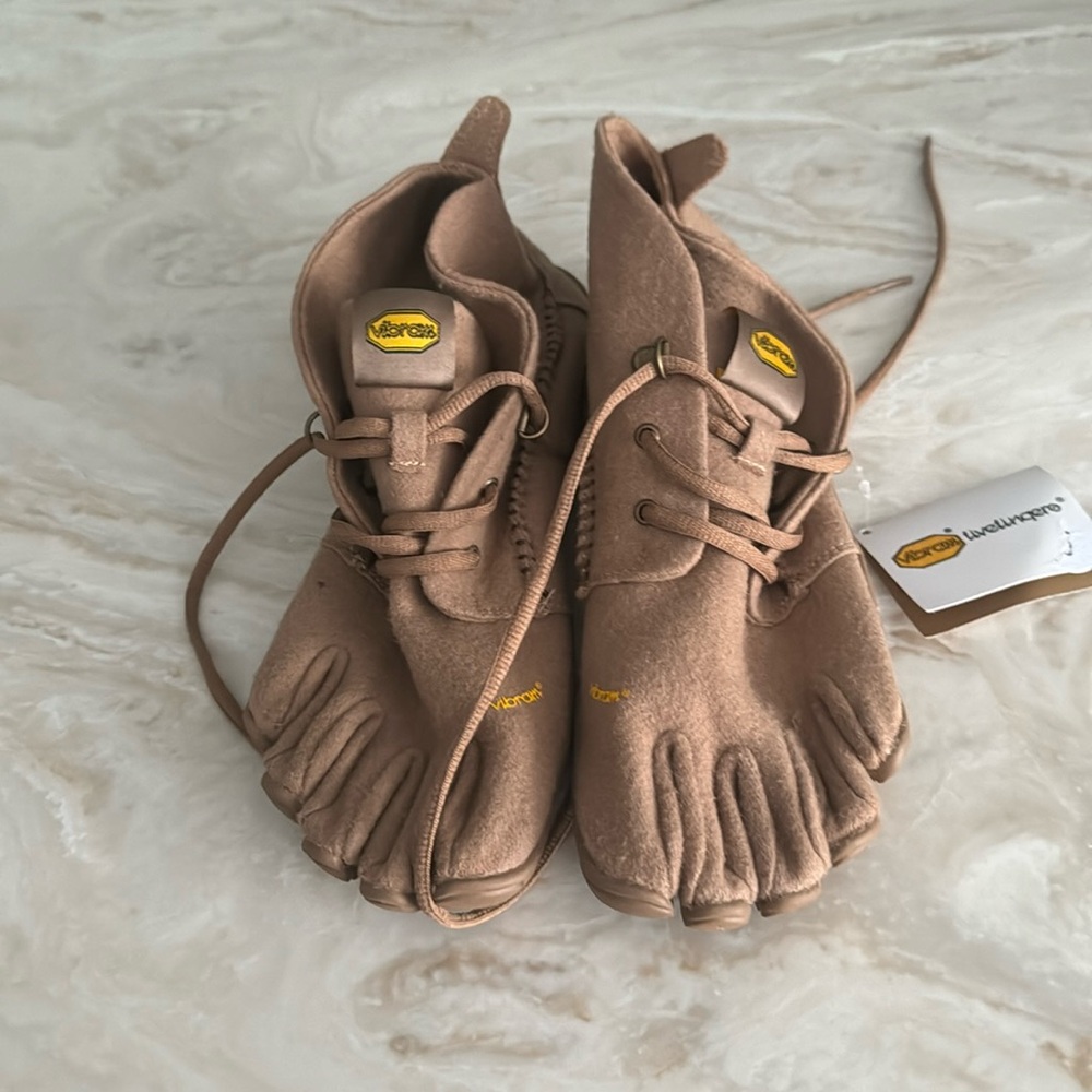 Brown feet shoes